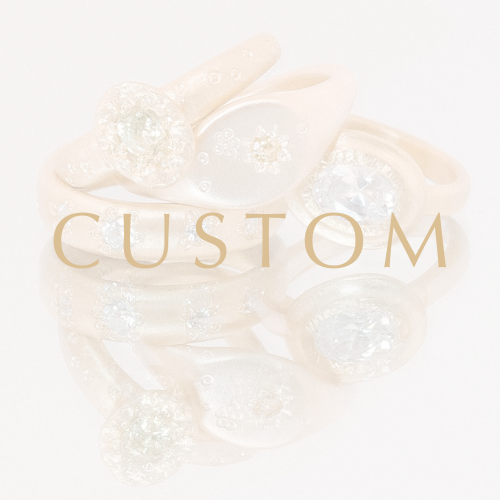 Custom engagement ring and wedding rings with sapphires and diamonds