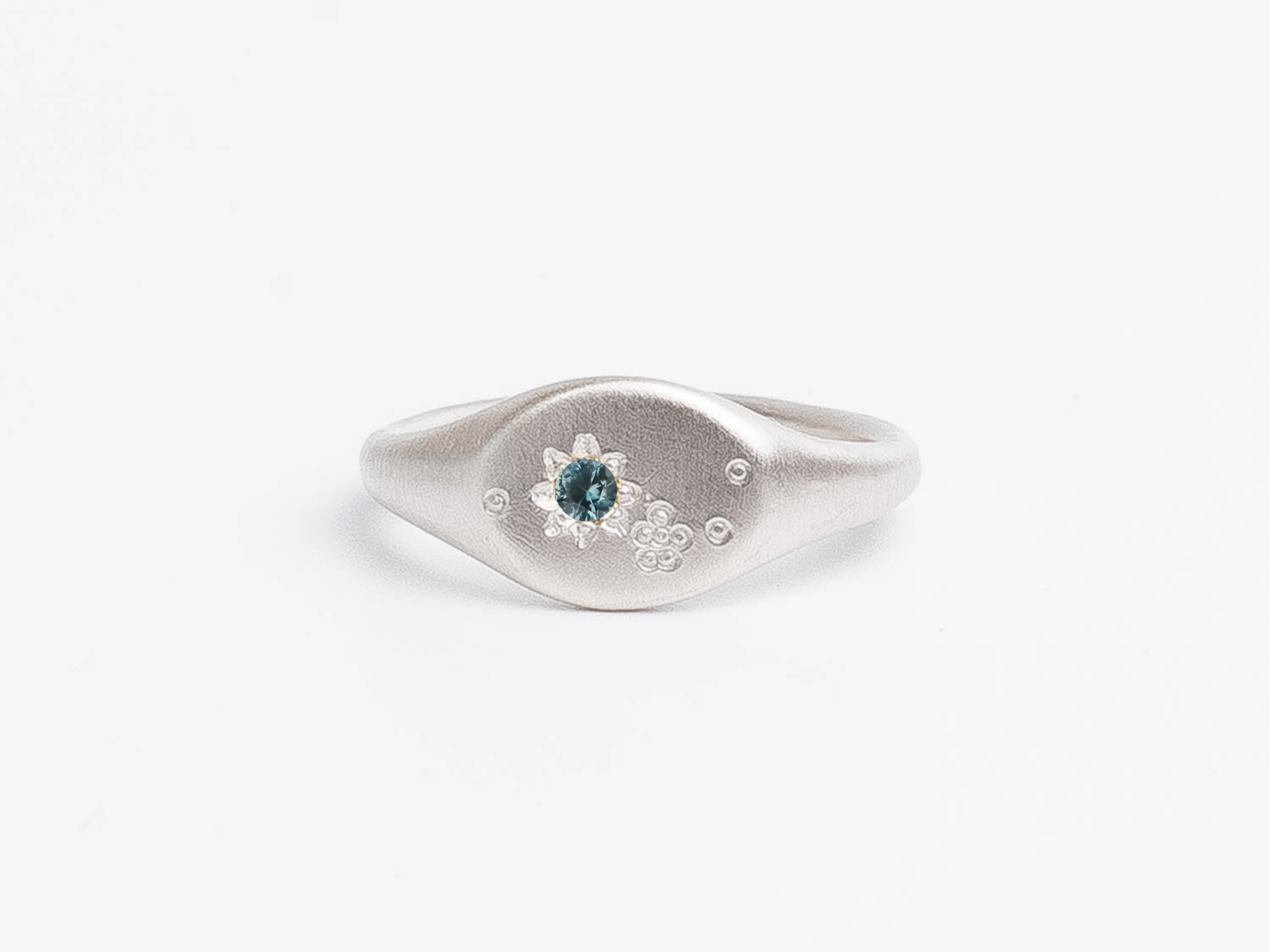 Custom Wattle Signet in sterling silver with a blue sapphire